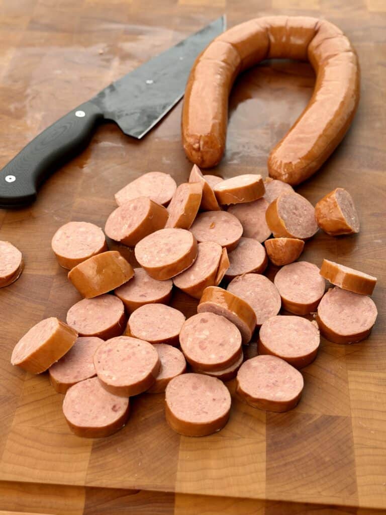 Cut Sausage on Cutting Board.