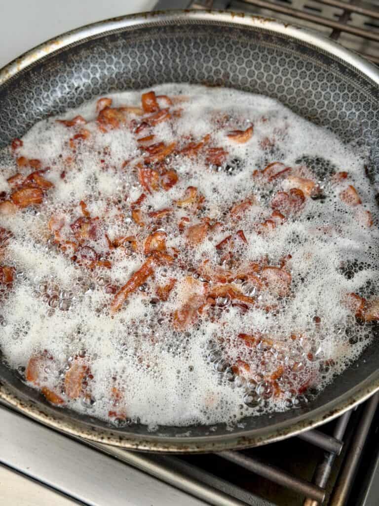 Cooked Bacon in Skillet.