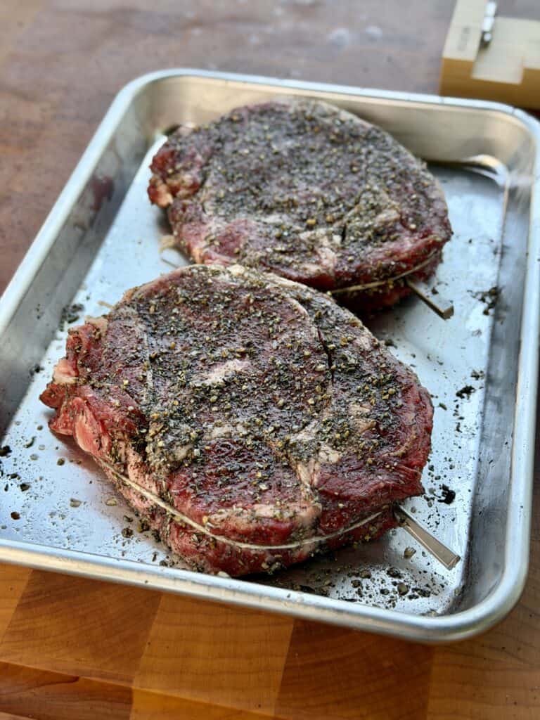 Ribeye Steaks Resting on Pan.