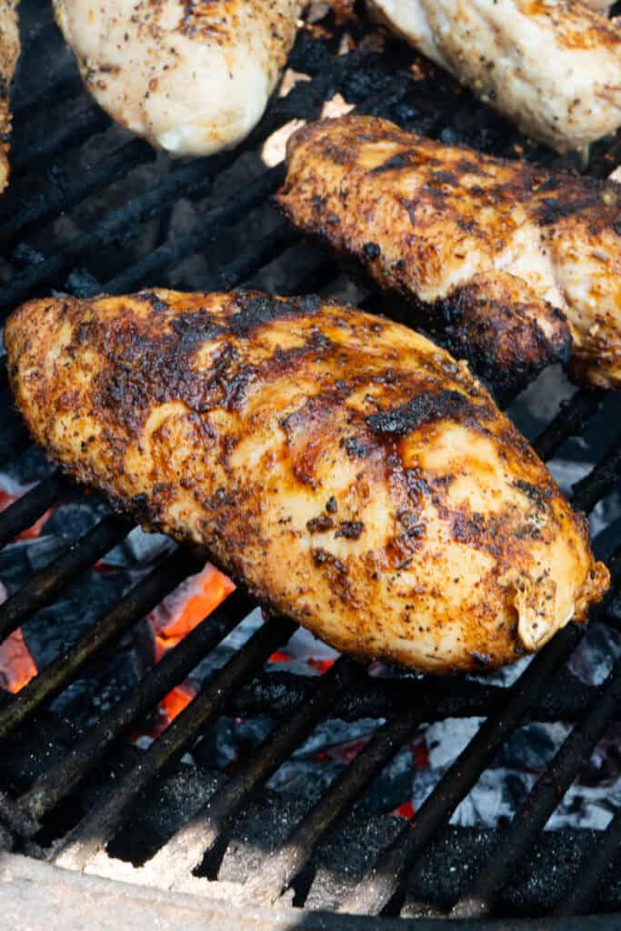 Grilled Chicken Breast on Grill.