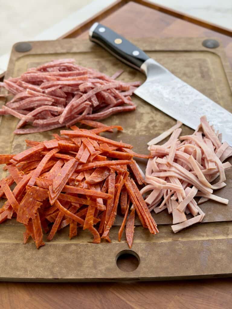Cut Deli Meat on Cutting board.