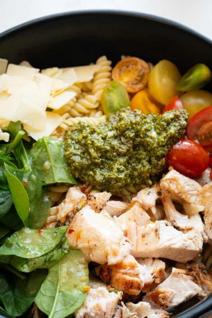 Bowl with Pesto added to Chicken Pasta Salad.
