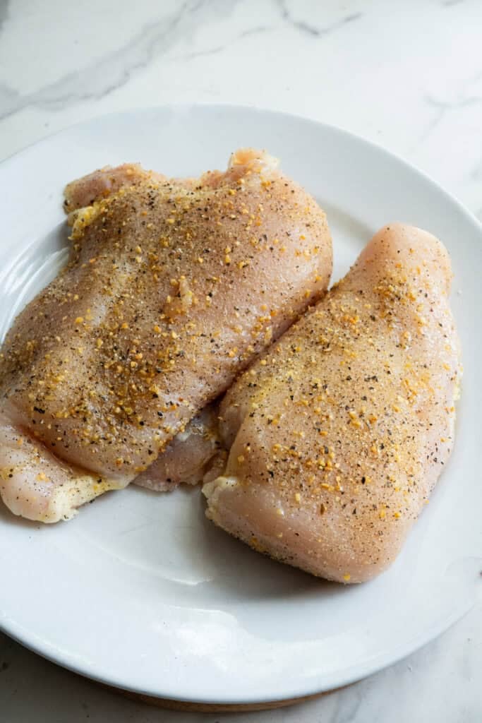 Seasoned Chicken Breast on plate.