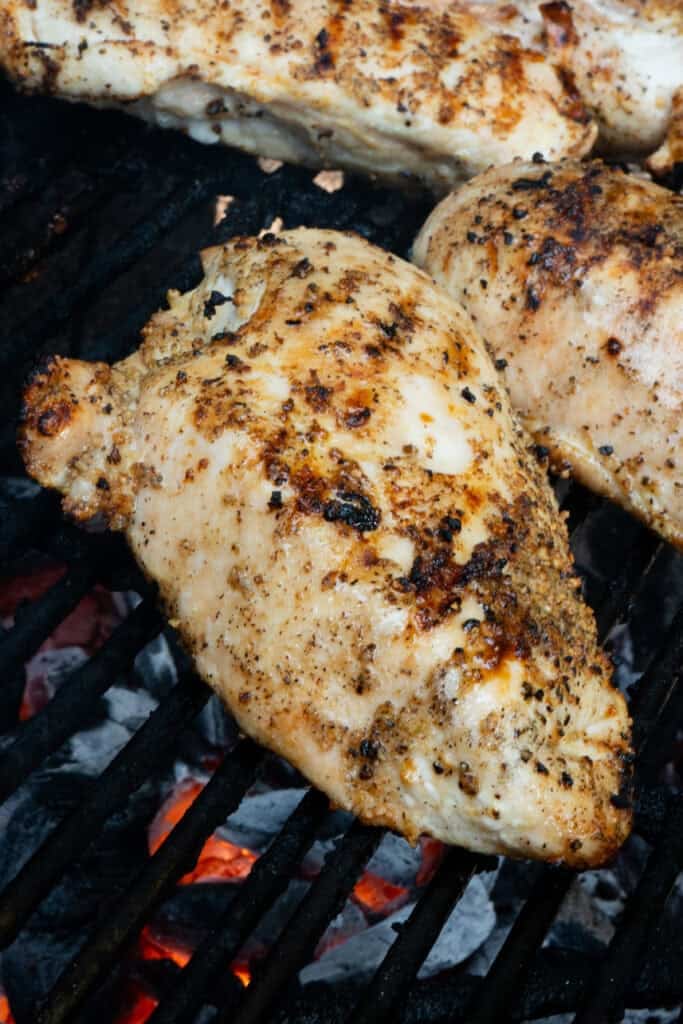 Grilled Chicken Breast on Grill.