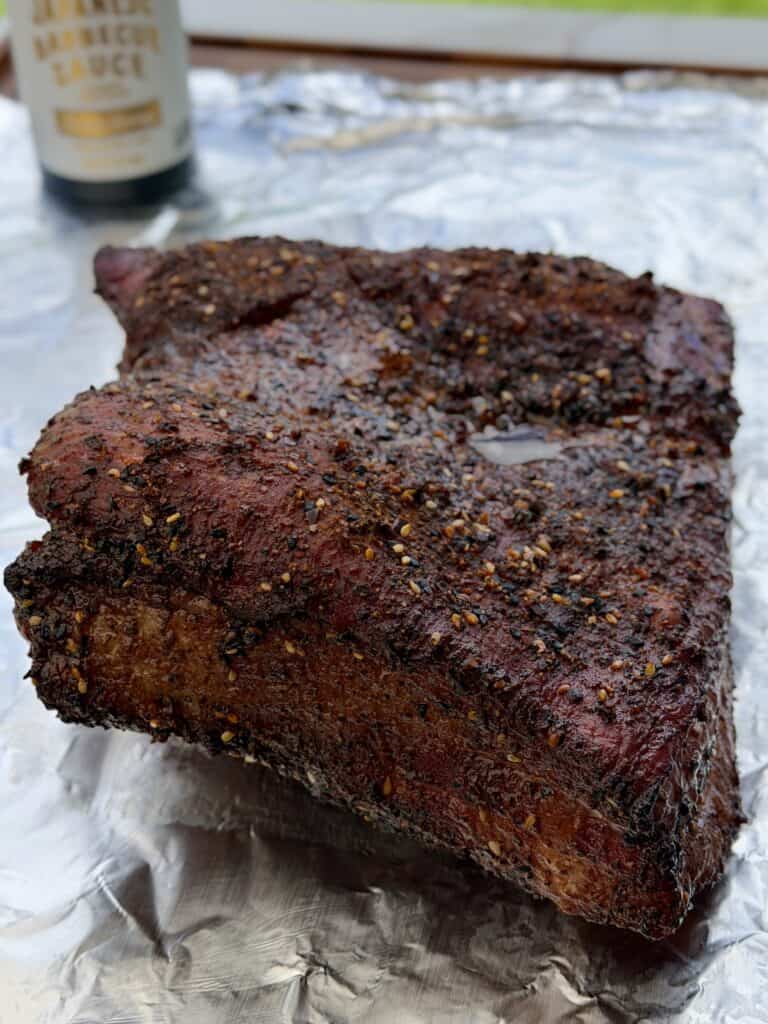 Cooked Pork Belly Meat on foil.