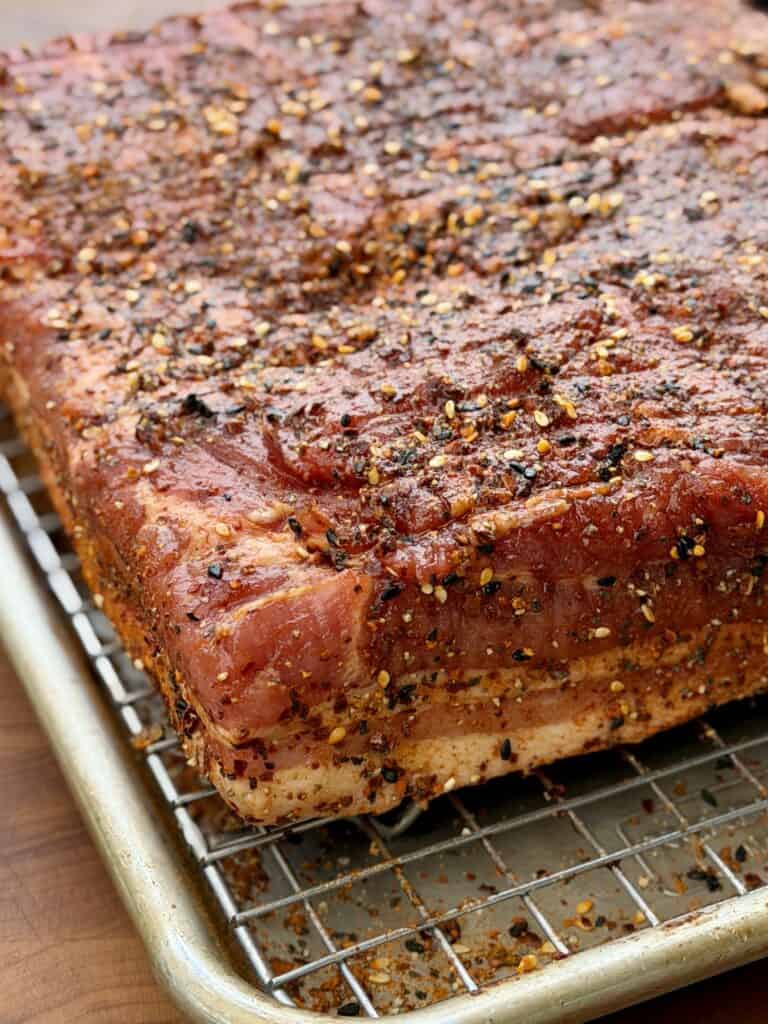 Seasoning on Meat on Wire rack.
