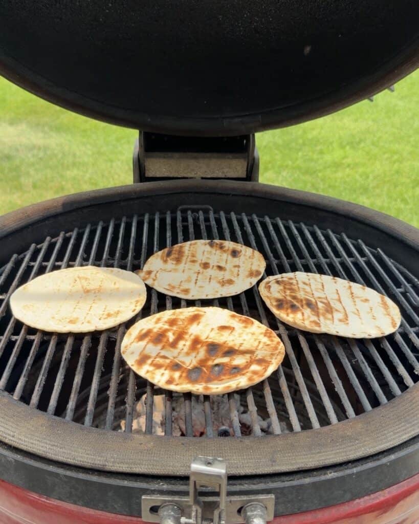 Tortillas on Grill browning.