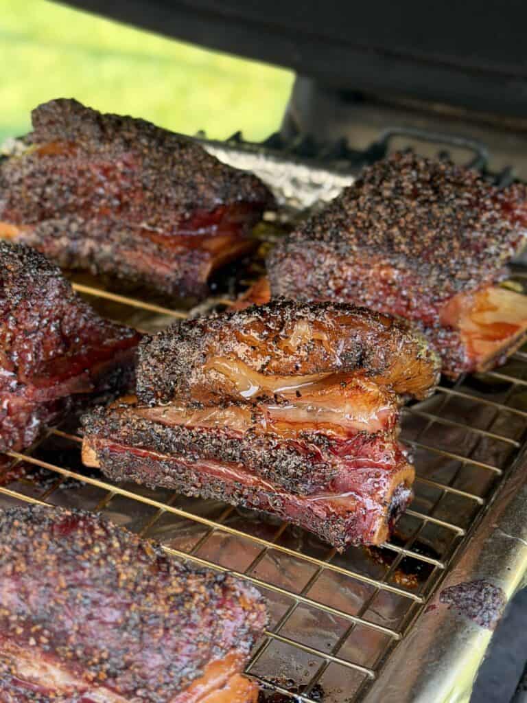Smoked Beef Short Rib Tacos cooking on smoker.