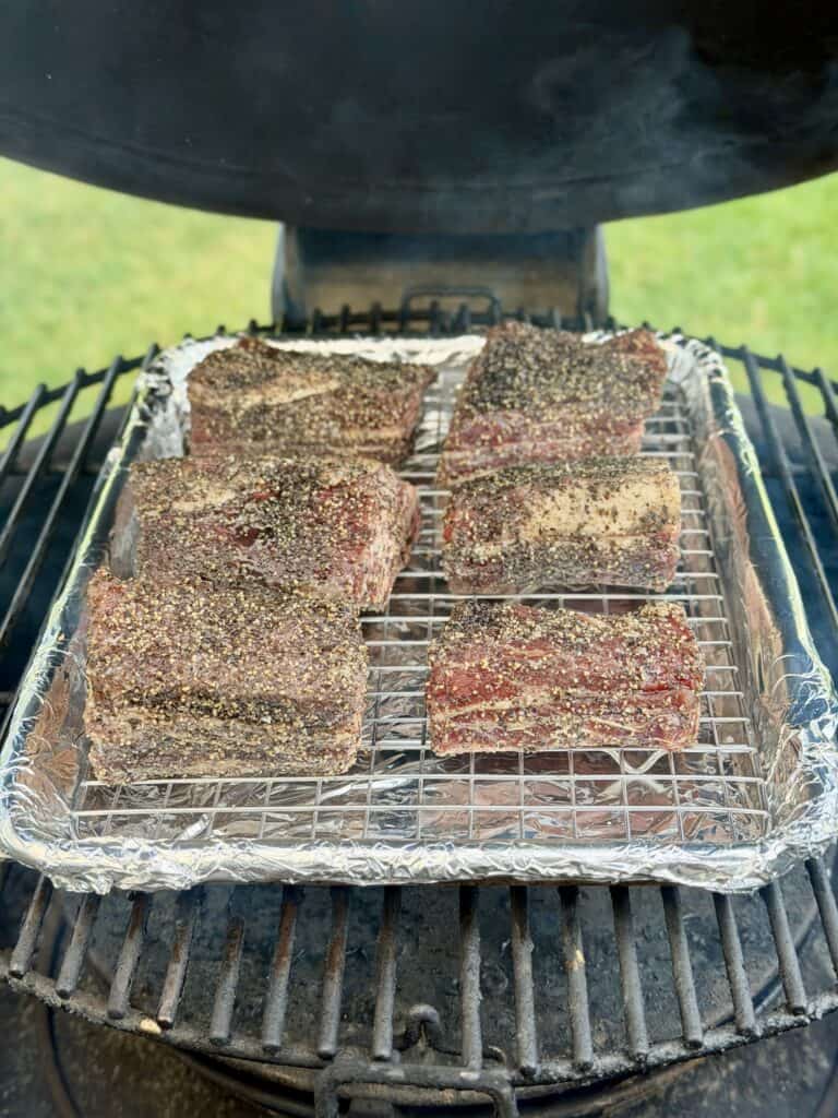 Smoked Beef Short Rib meat on smoker.