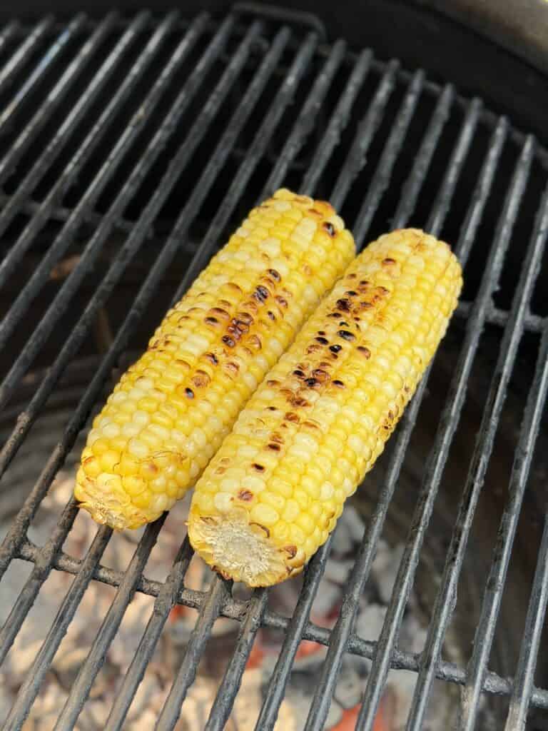 Grilling Corn on cob on grill.