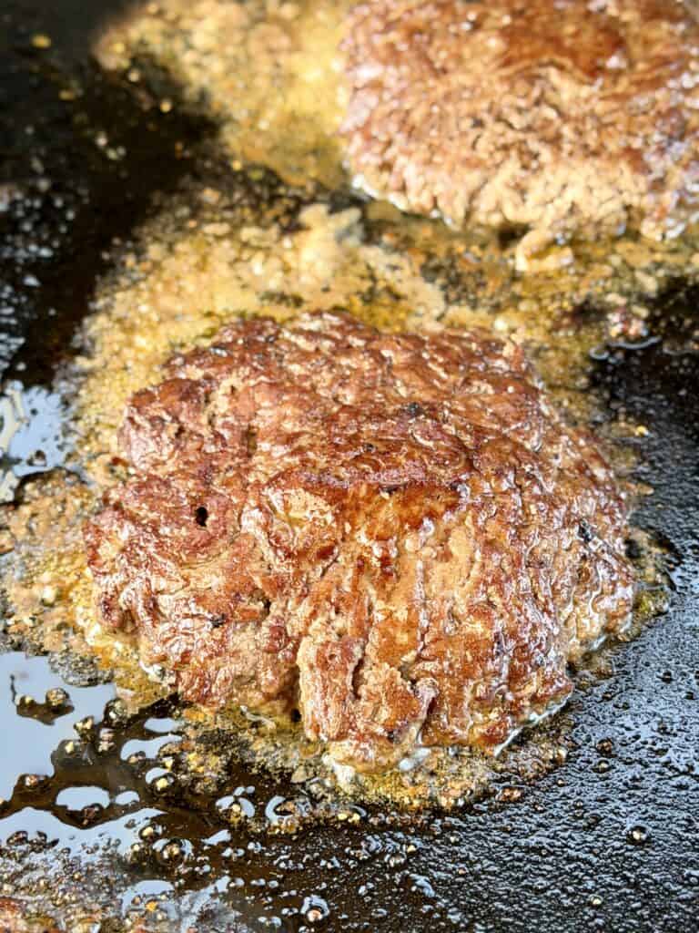Burgers cooking griddle.