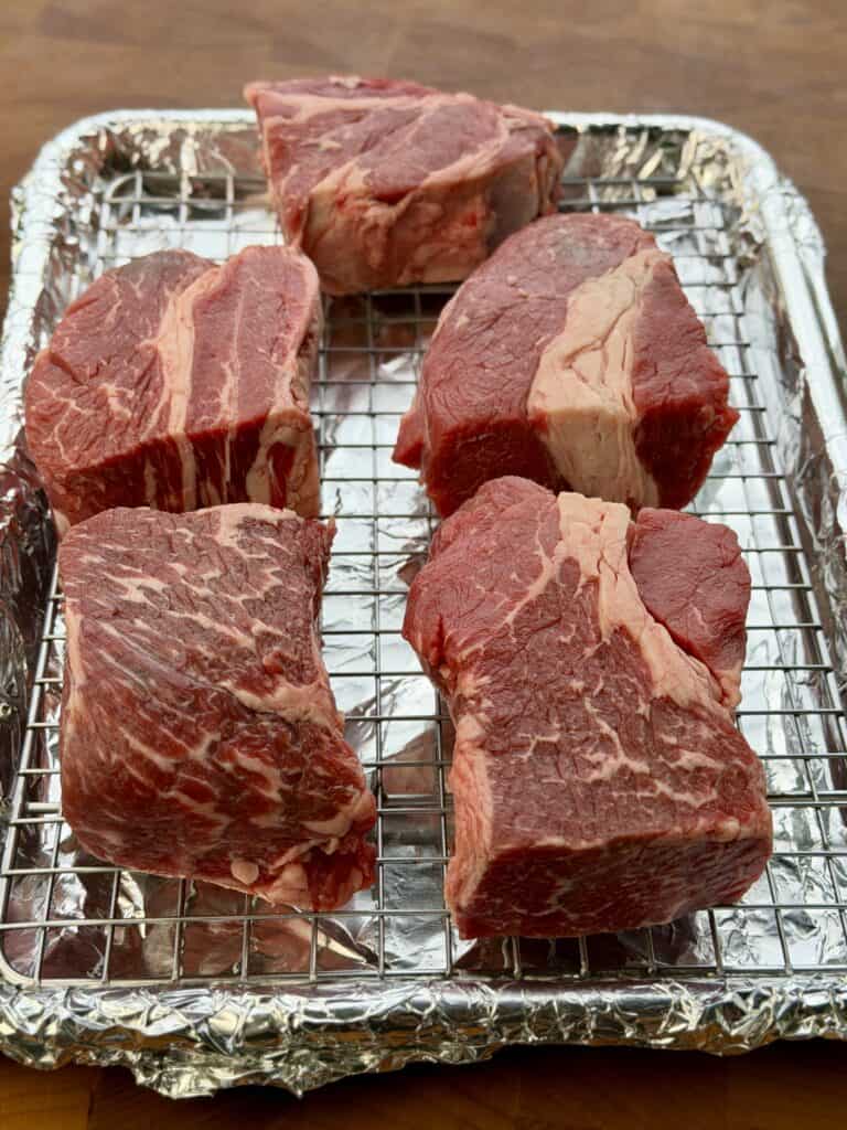 Cut beef on wire rack.