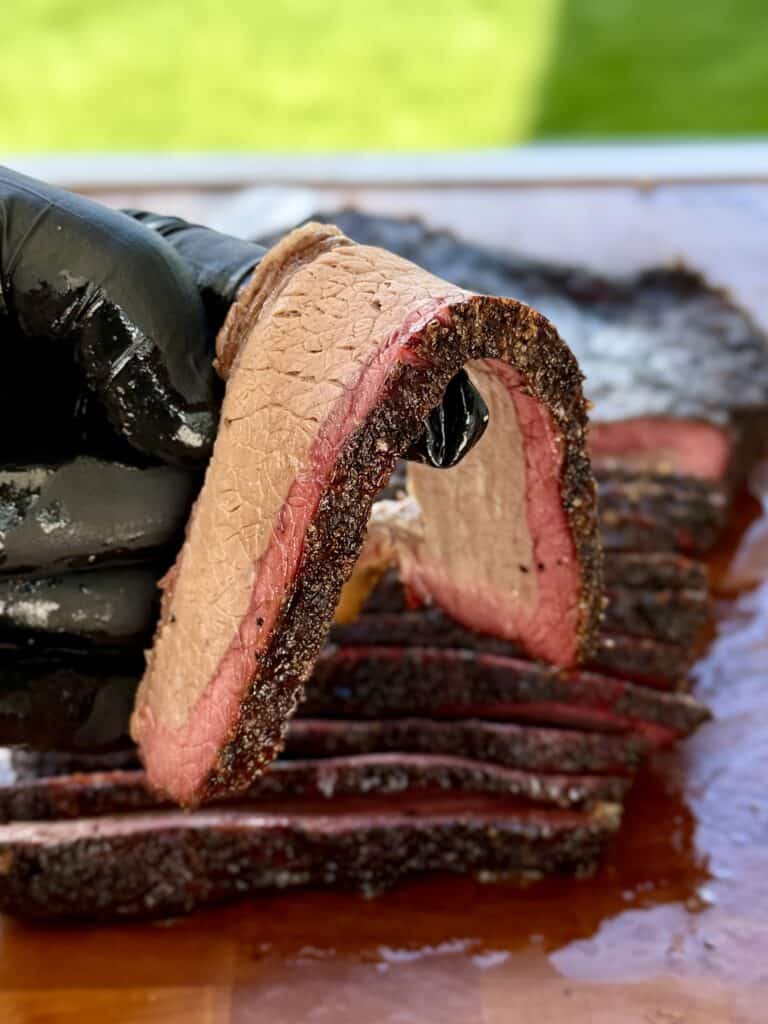 Cut Brisket meat on cutting board.