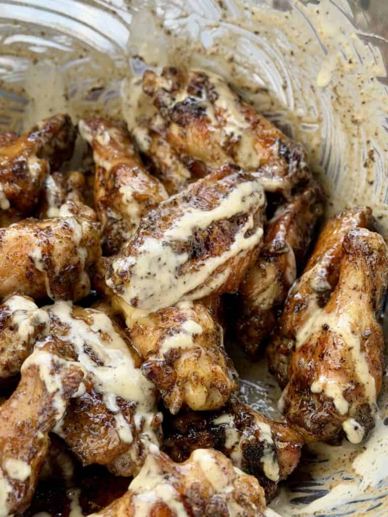 Grilled Cajun Wings with Alabama White Sauce.