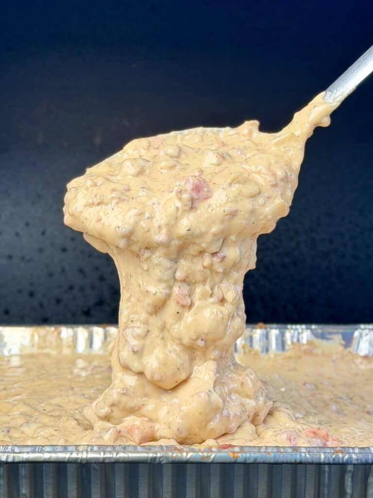 Queso on spoon.