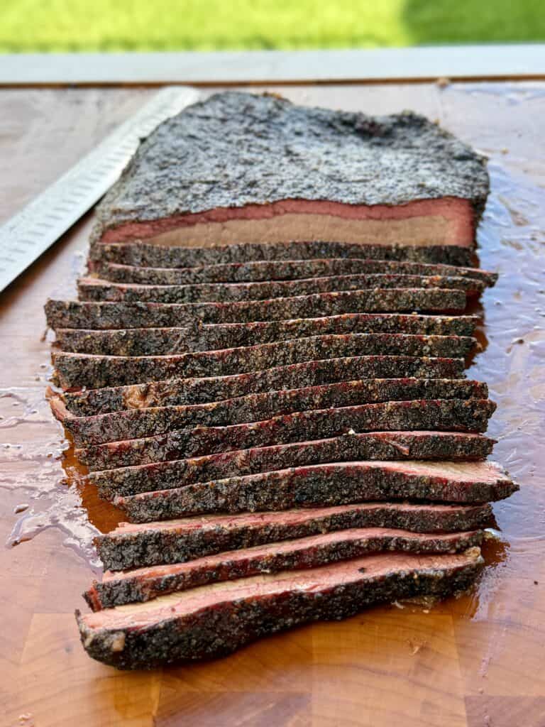 Brisket Croissant Sandwich meat sliced.