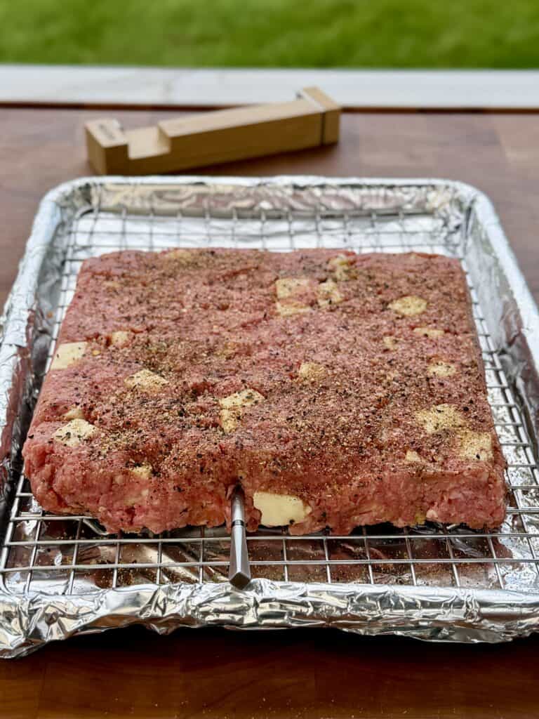 Burger mixture on wire rack.