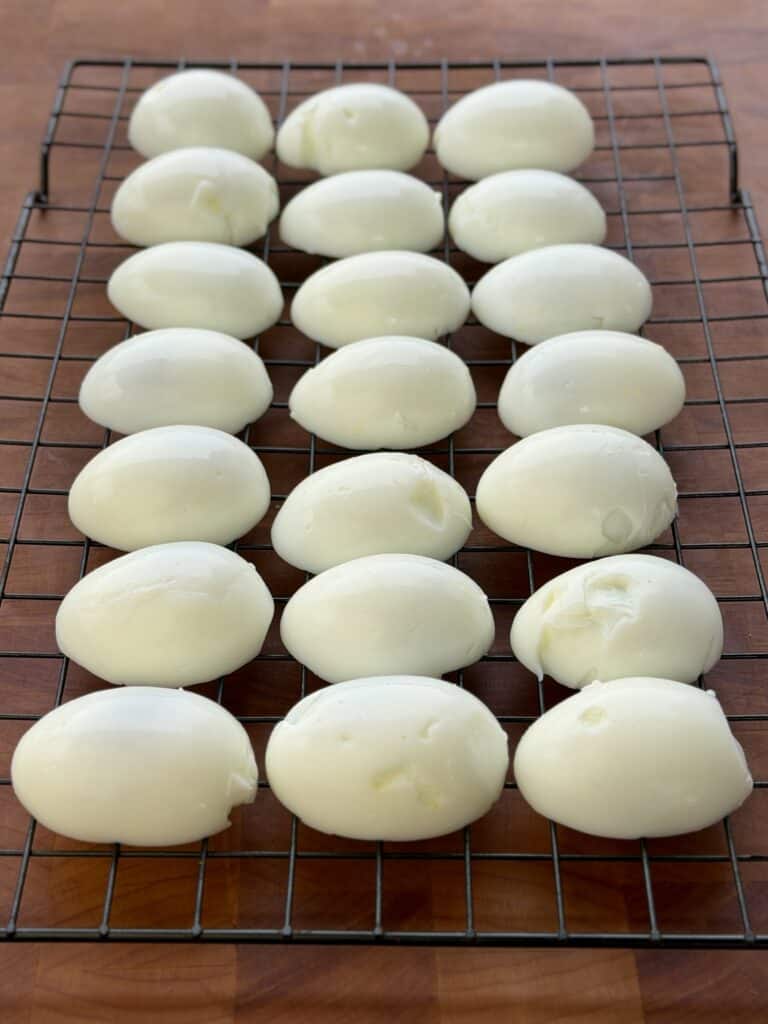 Cut eggs on wire rack.