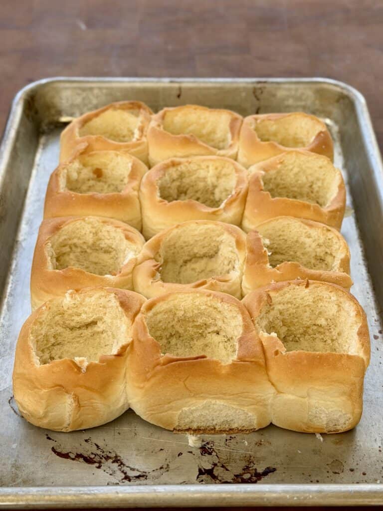 Buns in a pan with hole in middle.