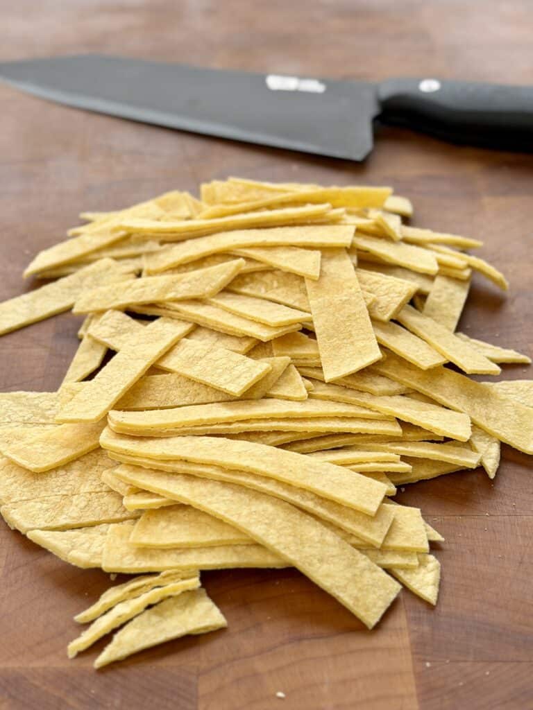 Cut tortilla strips.