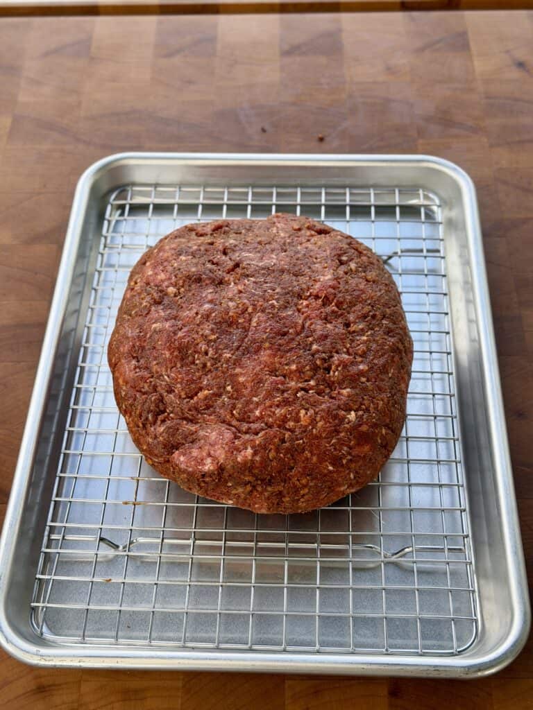 Hamburger on wire rack.